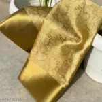 Nita Ambani Golden Embossed Tissue Silk Saree