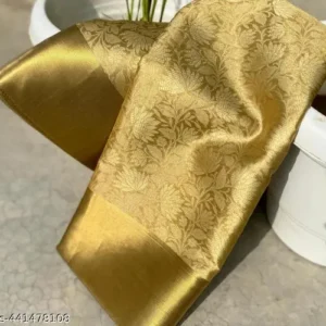 Nita Ambani Golden Embossed Tissue Silk Saree
